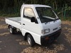 It is a picture of the white suzuki carry truck in 1995,Sub Photo 0 Stock No.Y026638