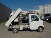 It is a picture of the white suzuki carry dump in 2007,First Photo Stock No.Y026708
