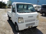 It is a picture of the white suzuki carry truck in 2005,First Photo Stock No.Y026709