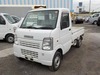 It is a picture of the white suzuki carry truck in 2003,Sub Photo 1 Stock No.Y026822