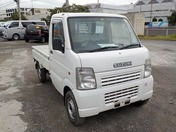 It is a picture of the white suzuki carry truck in 2003,First Photo Stock No.Y026822