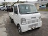 It is a picture of the white suzuki carry truck in 2003,Sub Photo 0 Stock No.Y026822