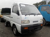 It is a picture of the white suzuki carry truck in 1991,First Photo Stock No.Y026838