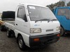 It is a picture of the white suzuki carry truck in 1991,Sub Photo 0 Stock No.Y026838