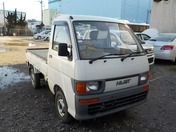 It is a picture of the white daihatsu hijet truck in 1995,First Photo Stock No.Y027288