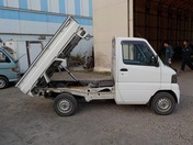 It is a picture of the white mitsubishi minicab dump in 2001,First Photo Stock No.Y027796