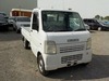 It is a picture of the white suzuki carry truck in 2003,Sub Photo 0 Stock No.Y027924