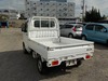 It is a picture of the white suzuki carry truck in 2003,Sub Photo 3 Stock No.Y027924