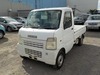 It is a picture of the white suzuki carry truck in 2003,Sub Photo 1 Stock No.Y027924