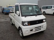It is a picture of the white mitsubishi minicab truck in 2004,First Photo Stock No.Y027951