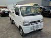It is a picture of the white suzuki carry truck in 2001,Sub Photo 0 Stock No.Y028083