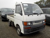 It is a picture of the white daihatsu hijet truck in 1995,First Photo Stock No.Y028276