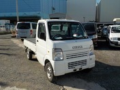 It is a picture of the white suzuki carry truck in 2007,First Photo Stock No.Y028373