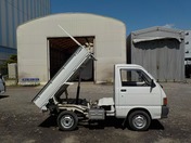 It is a picture of the white daihatsu hijet  dump in 1992,First Photo Stock No.Y028564