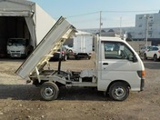 It is a picture of the white daihatsu hijet dump in 1997,First Photo Stock No.Y028693