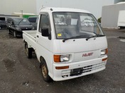 It is a picture of the white daihatsu hijet truck in 1995,First Photo Stock No.Y028725