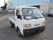 It is a picture of the white suzuki carry truck in 1995,First Photo Stock No.Y028861