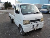 It is a picture of the white mazda scrum truck in 2001,First Photo Stock No.Y028907