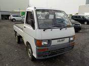 It is a picture of the white daihatsu hijet truck in 1995,First Photo Stock No.Y028908