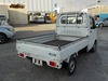 It is a picture of the white suzuki carry truck in 2002,Sub Photo 2 Stock No.Y029053