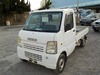 It is a picture of the white suzuki carry truck in 2002,Sub Photo 1 Stock No.Y029053
