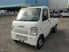 It is a picture of the white suzuki carry truck in 2005,Sub Photo 1 Stock No.Y029606