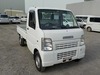 It is a picture of the white suzuki carry truck in 2005,Sub Photo 0 Stock No.Y029606
