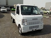 It is a picture of the white suzuki carry truck in 2009,First Photo Stock No.Y029635