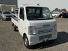 It is a picture of the white suzuki carry truck in 2004,Sub Photo 0 Stock No.Y029714