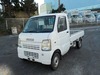 It is a picture of the white suzuki carry truck in 2002,Sub Photo 1 Stock No.Y029733