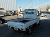 It is a picture of the white suzuki carry truck in 2002,Sub Photo 2 Stock No.Y029733