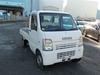 It is a picture of the white suzuki carry truck in 2002,Sub Photo 0 Stock No.Y029733