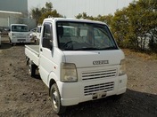 It is a picture of the white suzuki carry truck in 2004,First Photo Stock No.Y029774