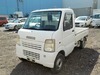 It is a picture of the white suzuki carry truck in 2004,Sub Photo 1 Stock No.Y029774