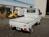 It is a picture of the white suzuki carry truck in 2004,Sub Photo 2 Stock No.Y029774