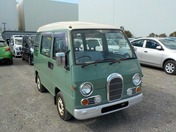 It is a picture of the green 2 subaru sambar dias passenger van in 1995,First Photo Stock No.Y029905