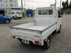 It is a picture of the white suzuki carry truck in 2002,Sub Photo 2 Stock No.Y029946