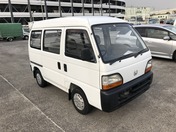 It is a picture of the white honda acty passenger van in 1995,First Photo Stock No.Y029975