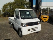 It is a picture of the white mitsubishi minicab truck in 2005,First Photo Stock No.Y030085