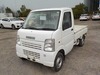 It is a picture of the white suzuki carry truck in 2004,Sub Photo 1 Stock No.Y030096