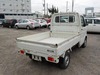 It is a picture of the white suzuki carry truck in 2004,Sub Photo 2 Stock No.Y030096