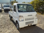 It is a picture of the white suzuki carry truck in 2007,First Photo Stock No.Y030099