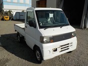 It is a picture of the white mitsubishi minicab truck in 2005,First Photo Stock No.Y030148