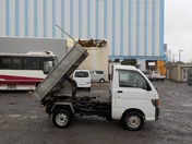 It is a picture of the white daihatsu hijet dump in 1996,First Photo Stock No.Y030222