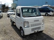 It is a picture of the white suzuki carry truck in 2004,First Photo Stock No.Y030492