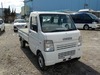 It is a picture of the white suzuki carry truck in 2004,Sub Photo 0 Stock No.Y030492