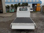 It is a picture of the white mitsubishi minicab truck in 2010,First Photo Stock No.Y030687