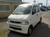 It is a picture of the white daihatsu hijet deck van in 2002,Sub Photo 1 Stock No.Y031011