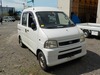 It is a picture of the white daihatsu hijet deck van in 2002,Sub Photo 0 Stock No.Y031011