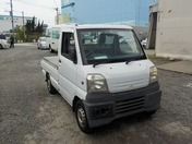 It is a picture of the white mitsubishi minicab truck in 1999,First Photo Stock No.Y031139